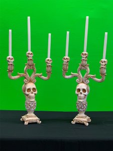 Large skull carved candelabras